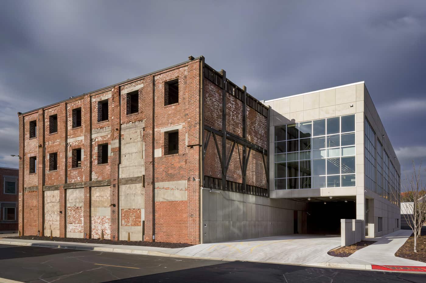 A wide overcast view of a completed reuse project seen from across the street.